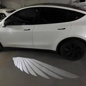 tesstudio_AngelWingCarLightProjectorForTeslaModelY_2_1000x_29e32a07-bff2-439c-94dc-ebc7e006d375